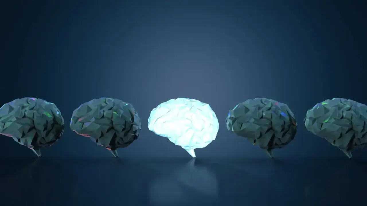 Świecący mózg pośród ciemnych, symbolizujący pozytywne skutki modlitwy dla zdrowia psychicznego i fizycznego, potwierdzone naukowo.